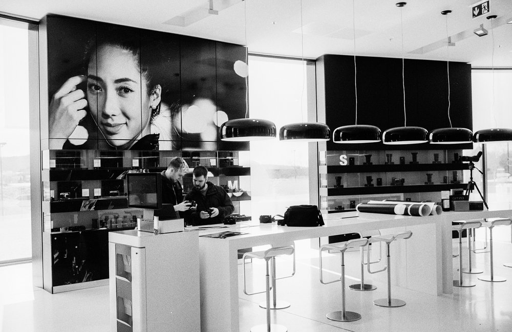   In the Leica store. Leica M6 TTL with 35mm Summilux, Kodak Tri-X 400, orange filter  
